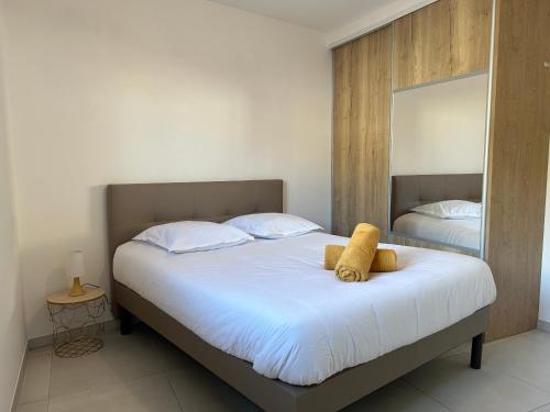 Posteľ alebo postele v izbe v ubytovaní Appartement sur le port