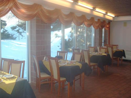 Restoran atau tempat lain untuk makan di Dom Wczasowo Rekreacyjny Zgoda