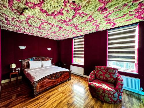 Postel nebo postele na pokoji v ubytování Baylis House Hotel