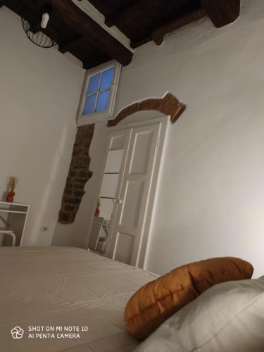 En eller flere senge i et værelse på Dante's Room dei Cerchi