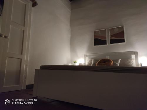 En eller flere senge i et værelse på Dante's Room dei Cerchi