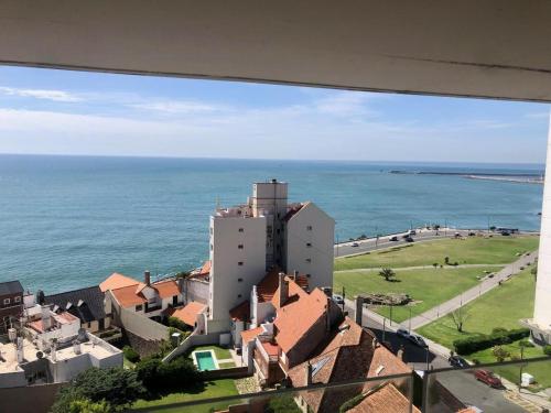 a view of the ocean from a building at deptomardel_playa in Mar del Plata