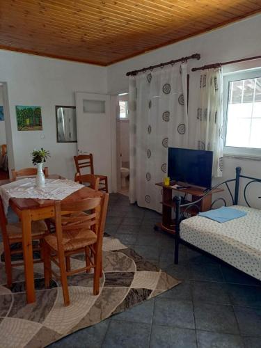 Кровать или кровати в номере Giota & Antonia Apartments