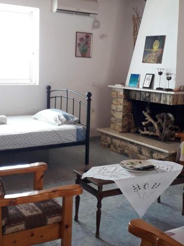 Кровать или кровати в номере Giota & Antonia Apartments