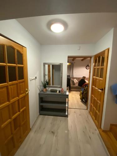 Una cama o camas en una habitación de Dom pod Jabłonia