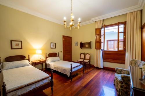 Postel nebo postele na pokoji v ubytování Espectacular Casa con Jardín "La Casa de Nena"