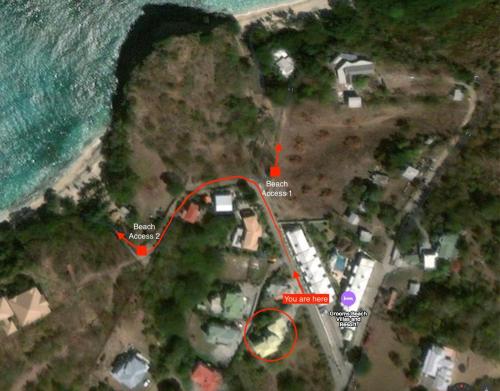 a map of a house on a beach with a red line at Kaibus Place- Quaint Quiet and Cosy in Morne Rouge