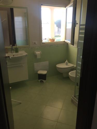 Bilik mandi di Sardegna Mer et Soleil in Olbia