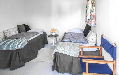 Postel nebo postele na pokoji v ubytování 3 Bedroom Cozy Home In Anholt