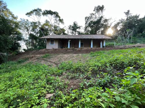 a small house on top of a hill at Ella Nine Peaks in Ella