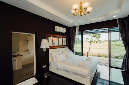 Ein Bett oder Betten in einem Zimmer der Unterkunft KEPT Cabana เคปท์ คาบานา