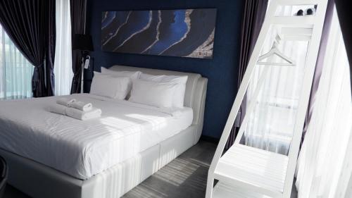 Ein Bett oder Betten in einem Zimmer der Unterkunft KEPT Cabana เคปท์ คาบานา