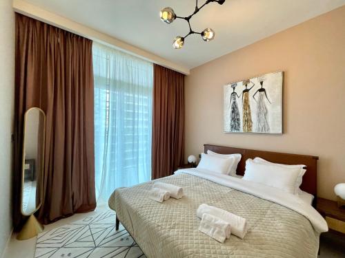 Dar Vacation – Luxury White & Badge 1BDR Apartment Palm View