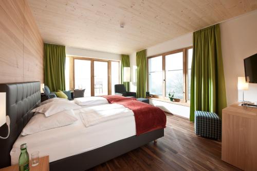 Posteľ alebo postele v izbe v ubytovaní Familien- Sportresort BRENNSEEHOF