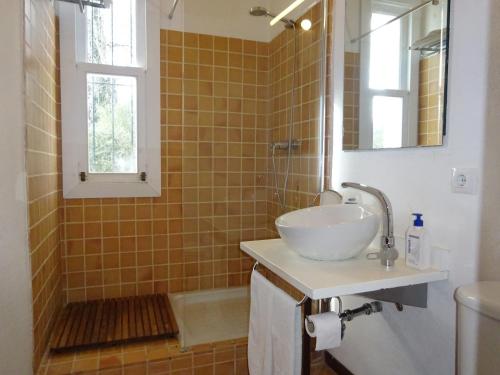 a bathroom with a sink and a shower at Ideal Property Mallorca - Can Flauta in Selva