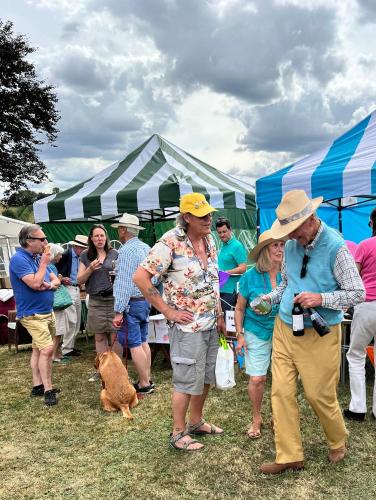 a group of people standing in front of tents at Valley View Farm, Bed and Breakfast in Batcombe