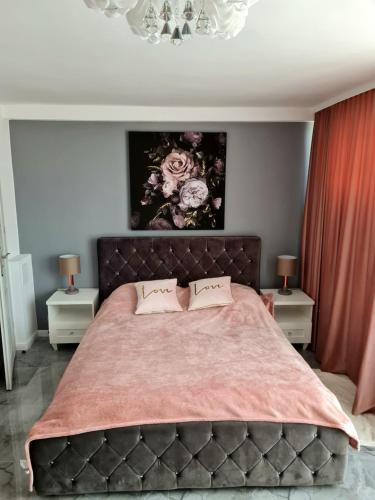 Ένα ή περισσότερα κρεβάτια σε δωμάτιο στο Apartament Wyzwolenia