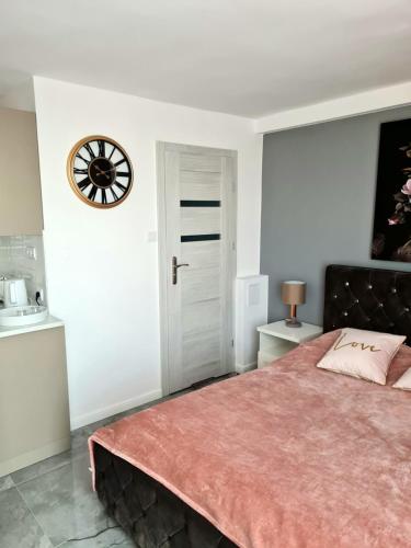 Tempat tidur dalam kamar di Apartament Wyzwolenia