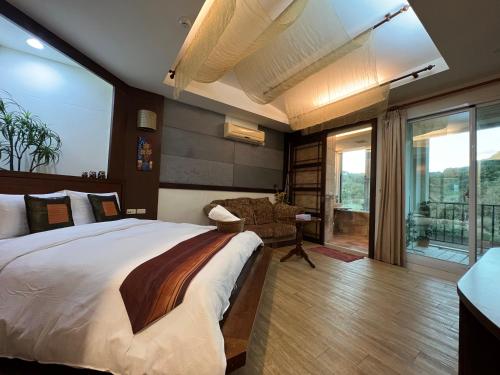 Postel nebo postele na pokoji v ubytování Ming Jun Homestay