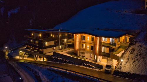 an aerial view of a building at night at Das Bergjuwel in Auffach
