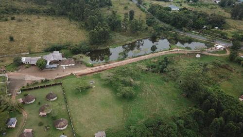 an aerial view of a bridge over a river at Noma-Nini Lodge in White River