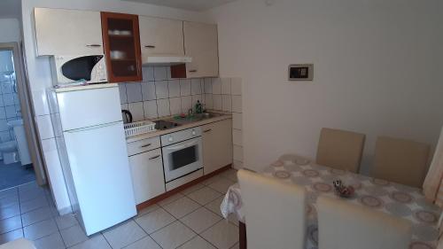 Fotografie z fotogalerie ubytování APARTMANI REŠETAR v destinaci Privlaka