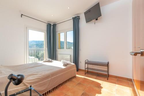 Postel nebo postele na pokoji v ubytování Villa la Roca