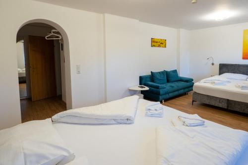 Postel nebo postele na pokoji v ubytování B&B Hotel Heimgartl