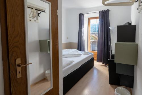 Postel nebo postele na pokoji v ubytování B&B Hotel Heimgartl
