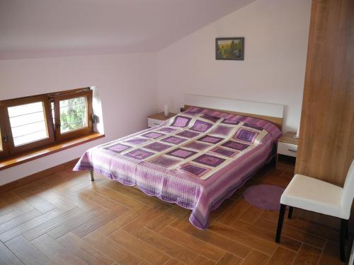 Postel nebo postele na pokoji v ubytování Apartments JASMINKA