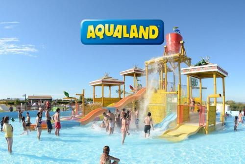a group of people playing in a water park at Sa Torreta in Algaida