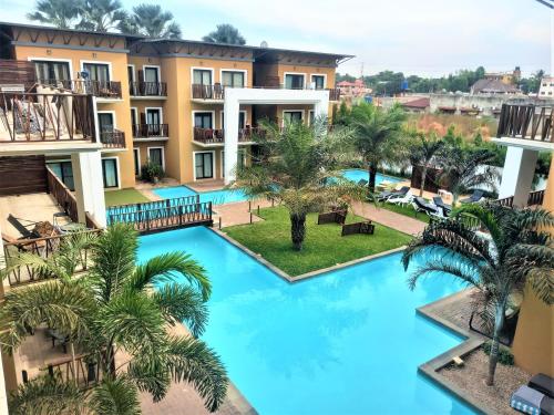 an overhead view of the pool at a resort at Forest View Apartments in Kololi