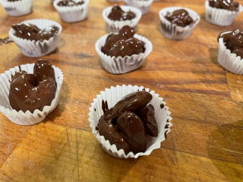 a group of chocolate muffins in paper cups on a table at B & B L'ABBRACCIO in Agnone