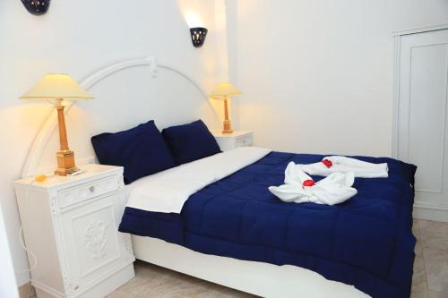 Ένα ή περισσότερα κρεβάτια σε δωμάτιο στο Luxor Oasis Guest House