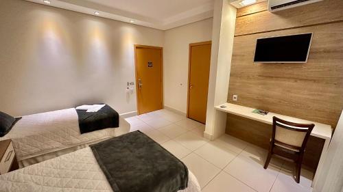 Postel nebo postele na pokoji v ubytování Hd Park Hotel