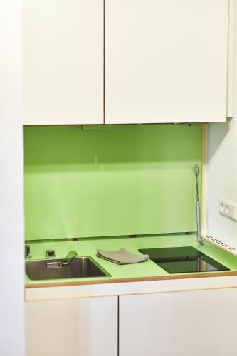 Kuchyň nebo kuchyňský kout v ubytování Sonnhof Apartments Tegernsee - zentral und perfekt für Urlaub & Arbeit