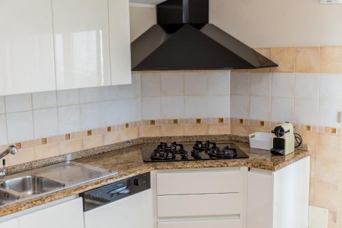Cucina o angolo cottura di Residenza Borgo degli Ulivi