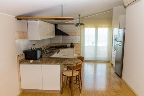 Cucina o angolo cottura di Residenza Borgo degli Ulivi