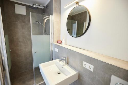 Koupelna v ubytování Sonnhof Apartments Tegernsee - zentral und perfekt für Urlaub & Arbeit