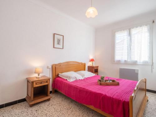 Tempat tidur dalam kamar di Apartment Etoile de Mer by Interhome
