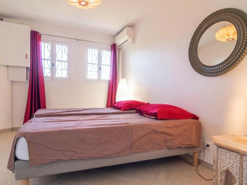 Katil atau katil-katil dalam bilik di Apartment Hibiscus by Interhome