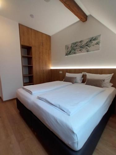 Ένα ή περισσότερα κρεβάτια σε δωμάτιο στο Lebererhof Apartments - XL2