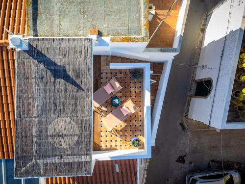 an overhead view of a room on a roof at No. 7 Olhão in Olhão