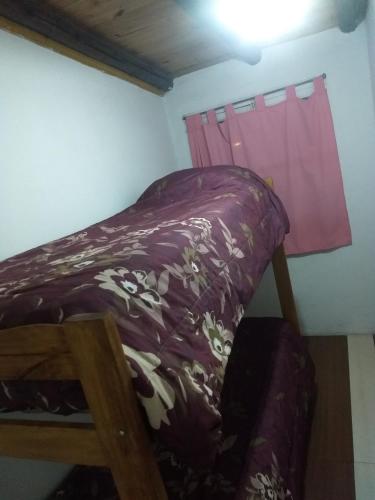 Una cama o camas en una habitación de Duplex San Rafael Mendoza