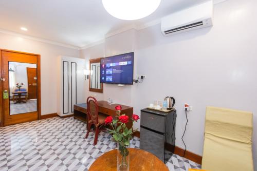 TV a/nebo společenská místnost v ubytování Hotel Valencia