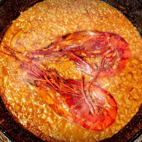 a pot of food with aopus on top of it at HOTEL IBERUM in Illescas