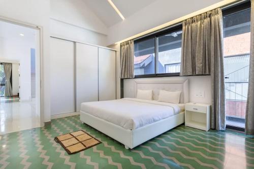 Katil atau katil-katil dalam bilik di Luxury 3BHK Villa with Private Pool near Anjuna