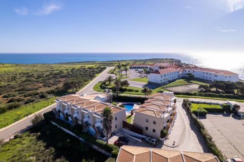 an aerial view of a house and the ocean at Pontalaia Apartamentos Turísticos in Sagres