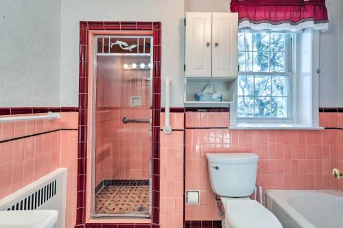a bathroom with a toilet and a shower at Yeadon Townhome with Porch, 7 Mi to Center City in Drexel Hill