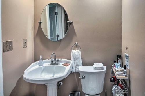 a bathroom with a sink and a mirror at Countryside Vacation Rental Retreat in Paola